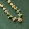 Emerald necklace with floral stone